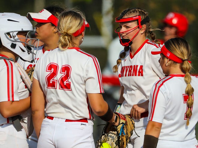 The Smyrna infield, with pitcher Alexis Dennis, huddles as they try to head off a Polytech fourth inning rally in Polytech's 8-3 win at Smyrna High School, Thursday, April 18, 2024.