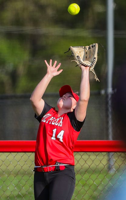 Polytech's Julia MacConnell tracks down a deep fly in the fifth inning of Polytech's 8-3 win at Smyrna High School, Thursday, April 18, 2024.