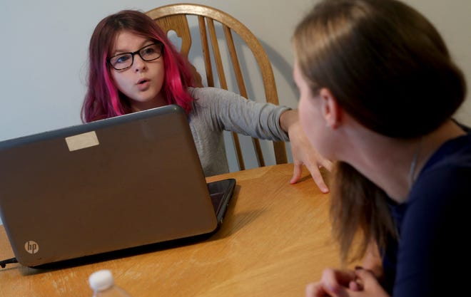 Toms River Intermediate North 7th grader Madison Brand, 12, speaks to her mother ToniAnn during her first virtual class from their home Tuesday, September 8, 2020.