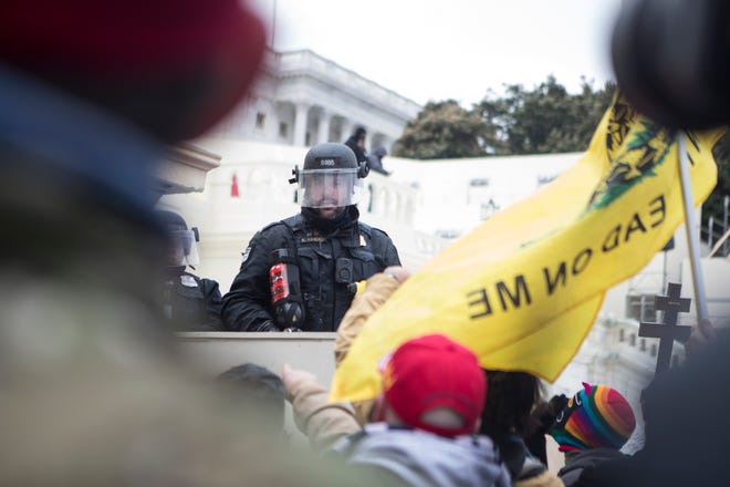Jan 6, 2021; Washington, DC, USA; Trump rioters storm the U.S. Capitol Wednesday afternoon as lawmakers inside debated the certification of the presidential election.  Mandatory Credit: Jerry Habraken-USA TODAY